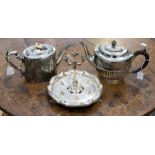 Two Victorian plated teapots and a later egg cup stand (3)