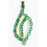 An emerald and diamond asymmetric pendant/brooch,