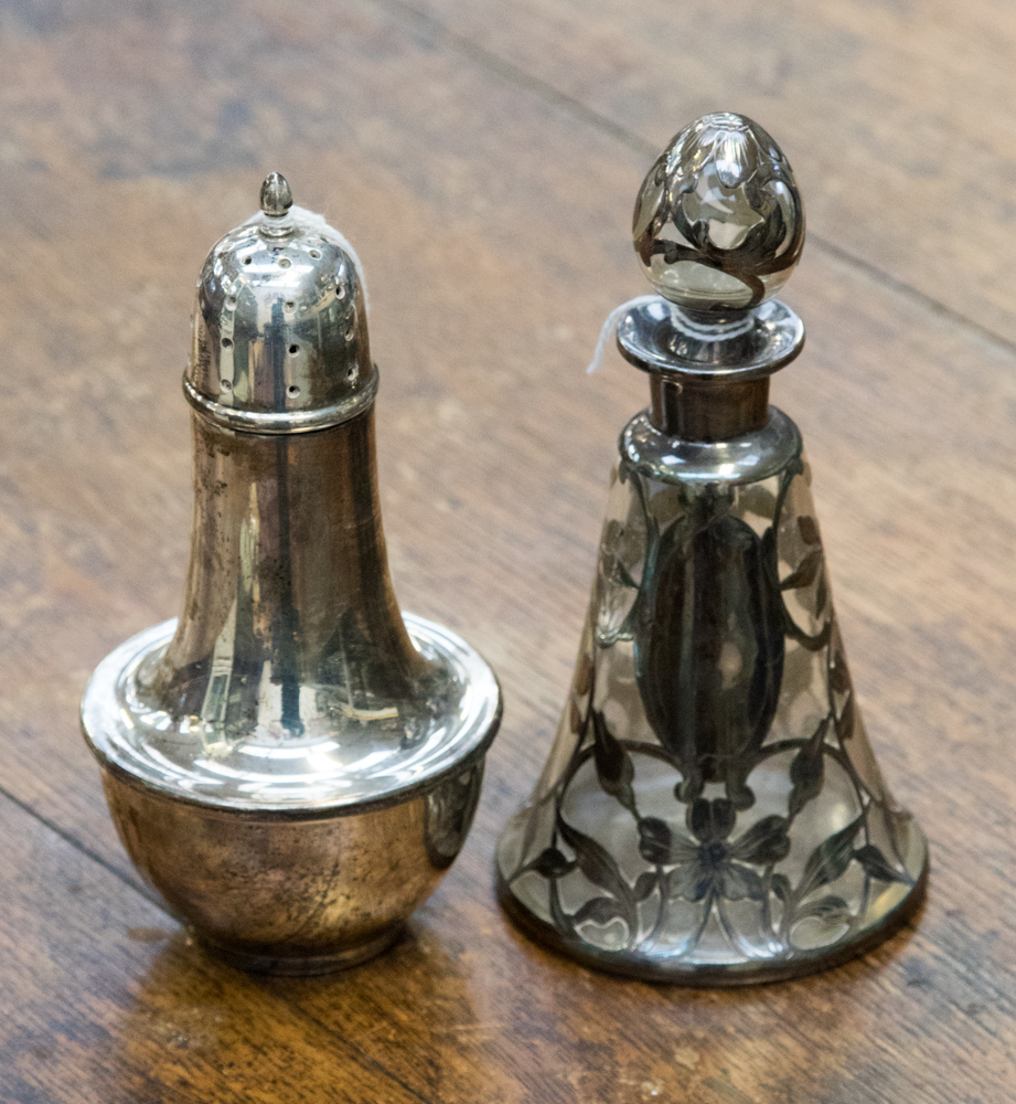 An Art Nouveau white metal overlaid scent bottle; together with a silver sugar shaker,