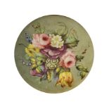 A pair of painted porcelain plaques, probably Derby, each decorated with floral bouquets,