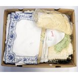 A box of table linen, including tray cloths, napkins,