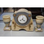 A marble cream and grey mantle clock and garniture Arabic numerals with key