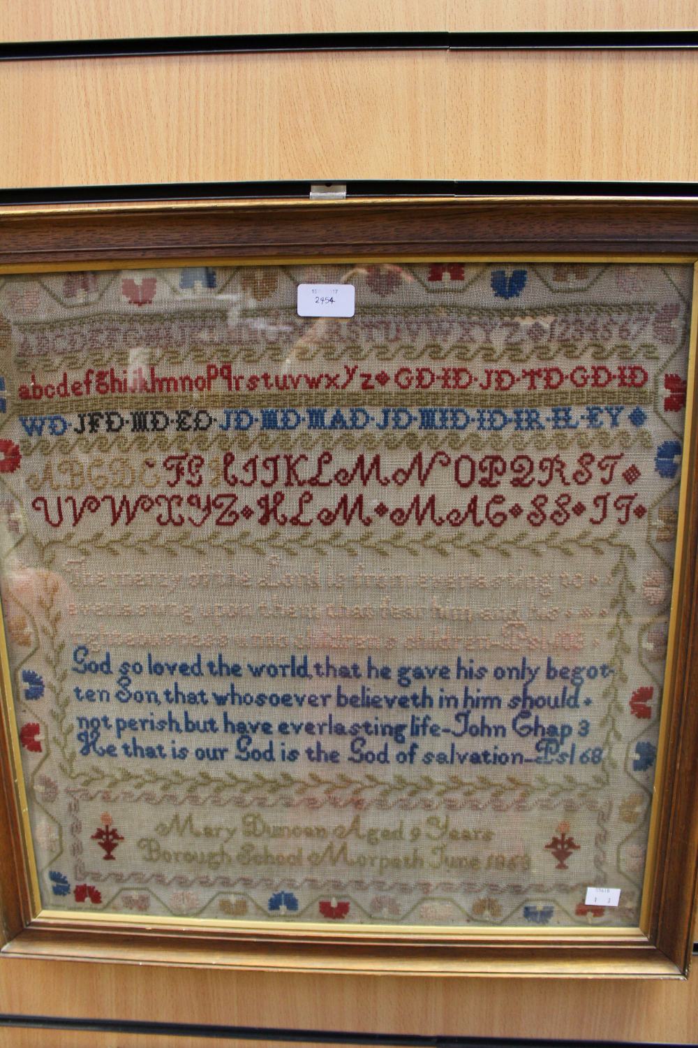 A Victorian alphabetical/motto textile sampler, worked by Mary Duncan, 1853,