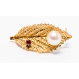 A gold, pearl and ruby leaf brooch, approximately 24mm, gross weight approximately 1.