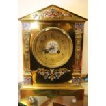 A late 19th Century French brass and champleve enamel bracket clock of architectural form,