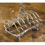 A Victorian silver seven-bar toast rack, Edward & John Barnard, London 1853, 7.