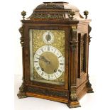 A large bracket clock, polished figured walnut, caddy top with metal fretwork,