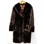 A good faux fur full length coat mid 1950