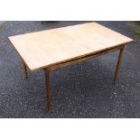 Ib Kofod Larsen for G-Plan, a Danish range teak dining table, with two end leaves, 89cm wide,