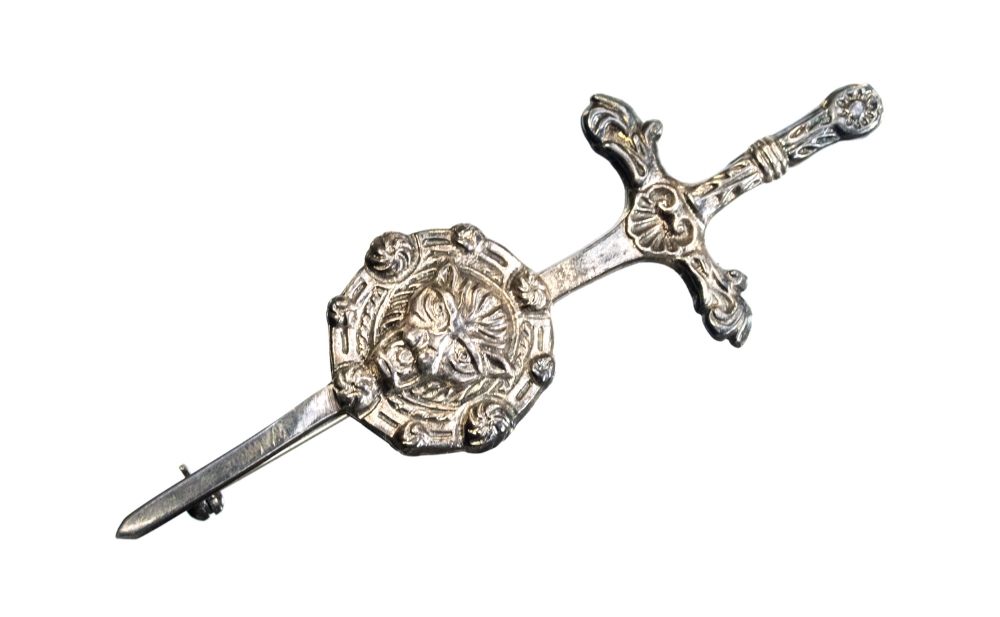 A Celtic silver brooch, Scottish sword and embossed shield design, James Coull, Edinburgh 1966,