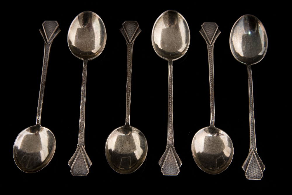 A set of Art Deco silver teaspoons, engine turned geometric design, with diamond shape finials,