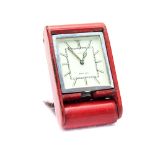 Le Coultre for Asprey, an Art Deco red leather and chrome 8 day travel clock, rectangular 2.