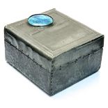 An Arts and Crafts pewter box set with a Ruskin high fired cabouchon, Secessionist style,