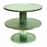 An aluminium two tier occasional table, circular, green tinted, with central column support,