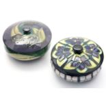 Two modern Moorcroft powder boxes and covers, Mackintosh Rose and black tulip designs,