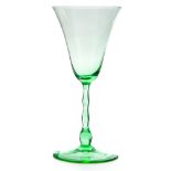 Simon Gate for Orrefors, a Secessionist uranium green Astrid wine glass, circa 1922,