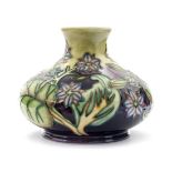 Modern Moorcroft squat baluster vase, 1999, flowers and leaves, impressed marks,