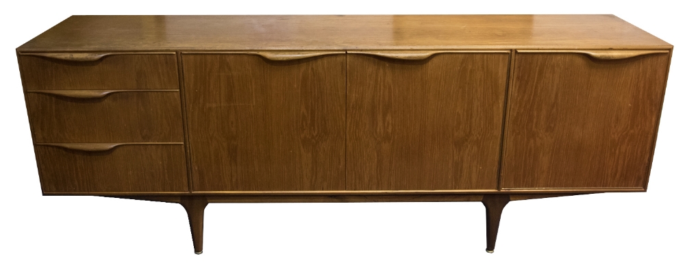 A McIntosh teak sideboard, circa 1950s, three cupboards and three drawers, each with lip handles,