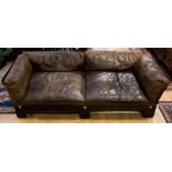 A pair of 1970s leather sofas,