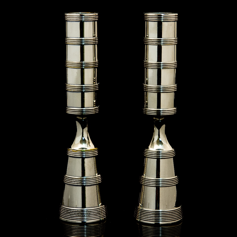 Jens Harald Quistgaard for Dansk, a pair of Danish silver plated candlesticks, circa 1964,