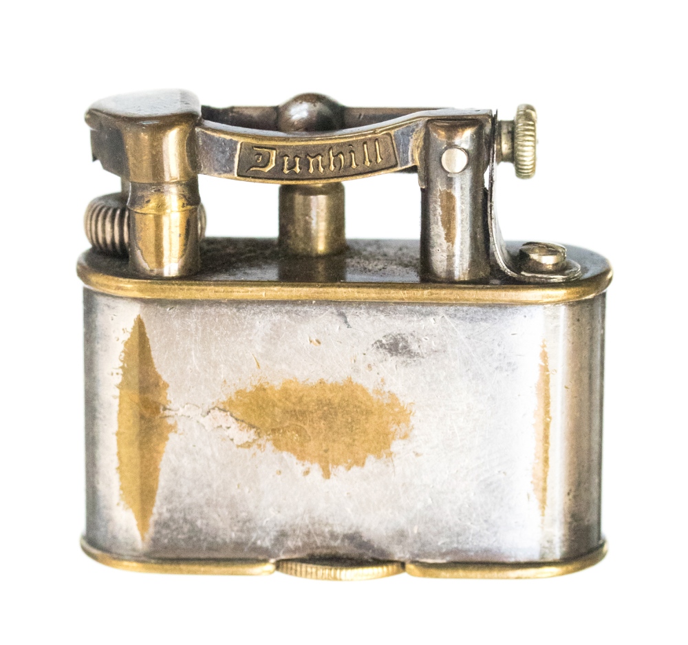 Alfred Dunhill, a silver plated miniature Unique lift arm table lighter, number 143752,