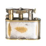 Alfred Dunhill, a silver plated miniature Unique lift arm table lighter, number 143752,