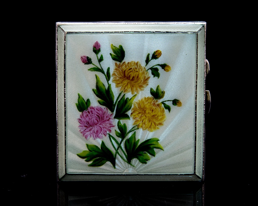 A 1950s silver and enamelled cigarette case,