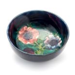 William Moorcroft, a poppy bowl, blue teal, impressed signature mark,