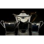 An Art Deco silver plated teaset, angled form with applied geometric stepped motifs,