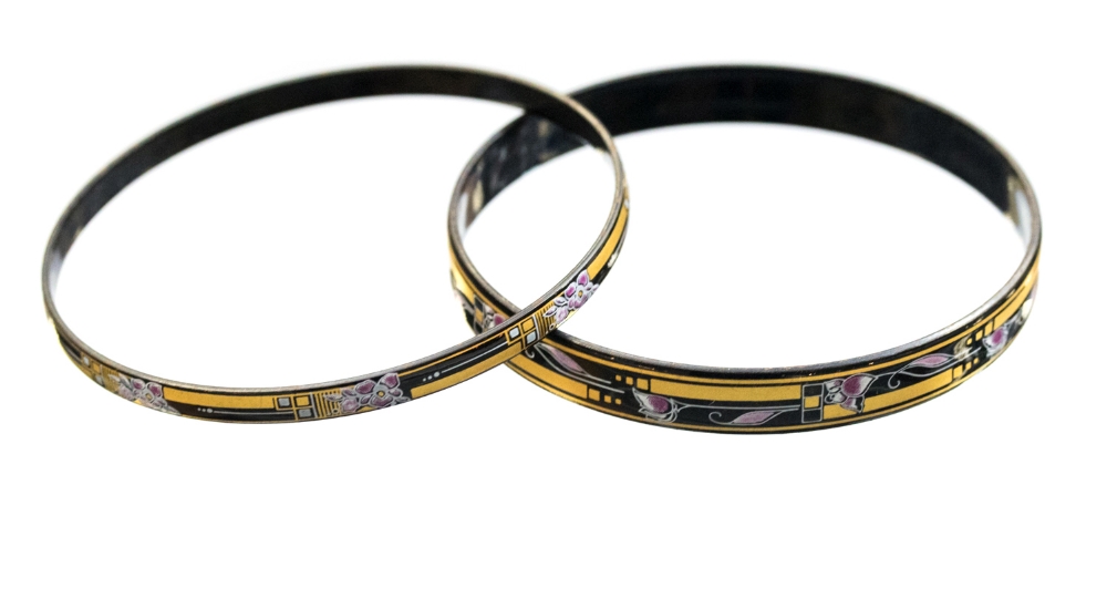 Michaela Frey, a pair of Secessionist style enamelled metal bangles,