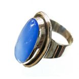 Carl Ove Frydensberg, a Danish Modernist silver and opalescent blue cabouchon ring, oval form,