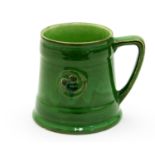 William Moorcroft for Liberty, a green glazed Flamminian mug,