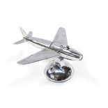 Alfred Dunhill, a novelty chrome table lighter in the form of a fighter plane,