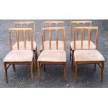 A set of six teak dining chairs, probably Ib Kofod Larsen for G-Plan,