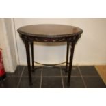 An Edwardian mahogany oval occasional table,