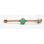 Turquoise and rose gold bar brooch, the turquoise cabachon in rub-over setting,