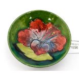 Moorcroft Hibiscus small raised dish with label on green ground