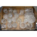 A box containing a collection of various cut glass, including "RAVENSHEAD" tumblers, vases, bowls,