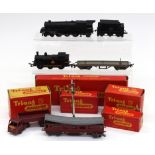 A collection of various model train accessories, including Triang railway box, coal carrier,
