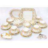 A Wedgwood 'Gold Columbia' part tea set, including teapot, sugar, milk, cake plate, etc,