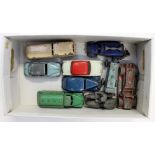 A box containing a collection of various early to mid 20th Century model cars, mostly Dinky,