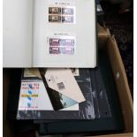 A box of stamps and stamp albums, various to in FDCs and worldwide.