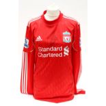 Signed Football Shirt: A 2011/2012 red home Liverpool shirt,