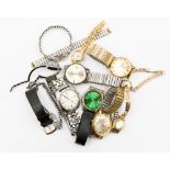 A bag of eleven ladies and men's wristwatches, including Timex, Rotary,