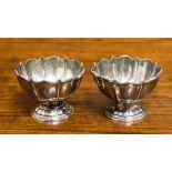 A pair of Edwardian pedestal salts, hallmark Birmingham 1905,