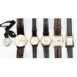 A bag containing a collection of various wristwatches,