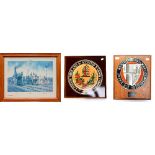 A presentation shield, The Great Western Railway Company and a LMS Crest,