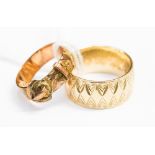 A 9ct gold patterned wedding band, size Q½ and a 9ct gold buckle ring, size N, total weight 9.