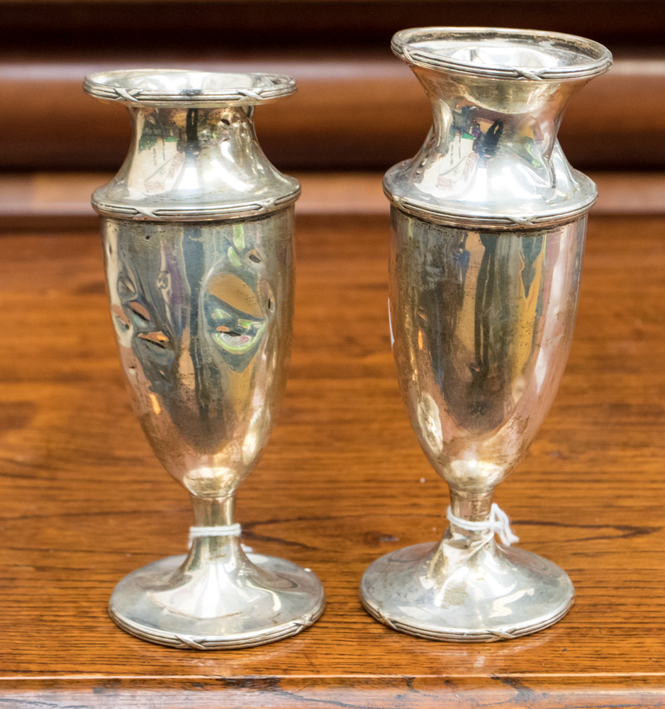 A pair of Edwardian silver baluster vases, Joseph Gloster Ltd, Birmingham, 1911 and 1912 (af),