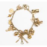 A 9ct gold charm bracelet, approx 28.